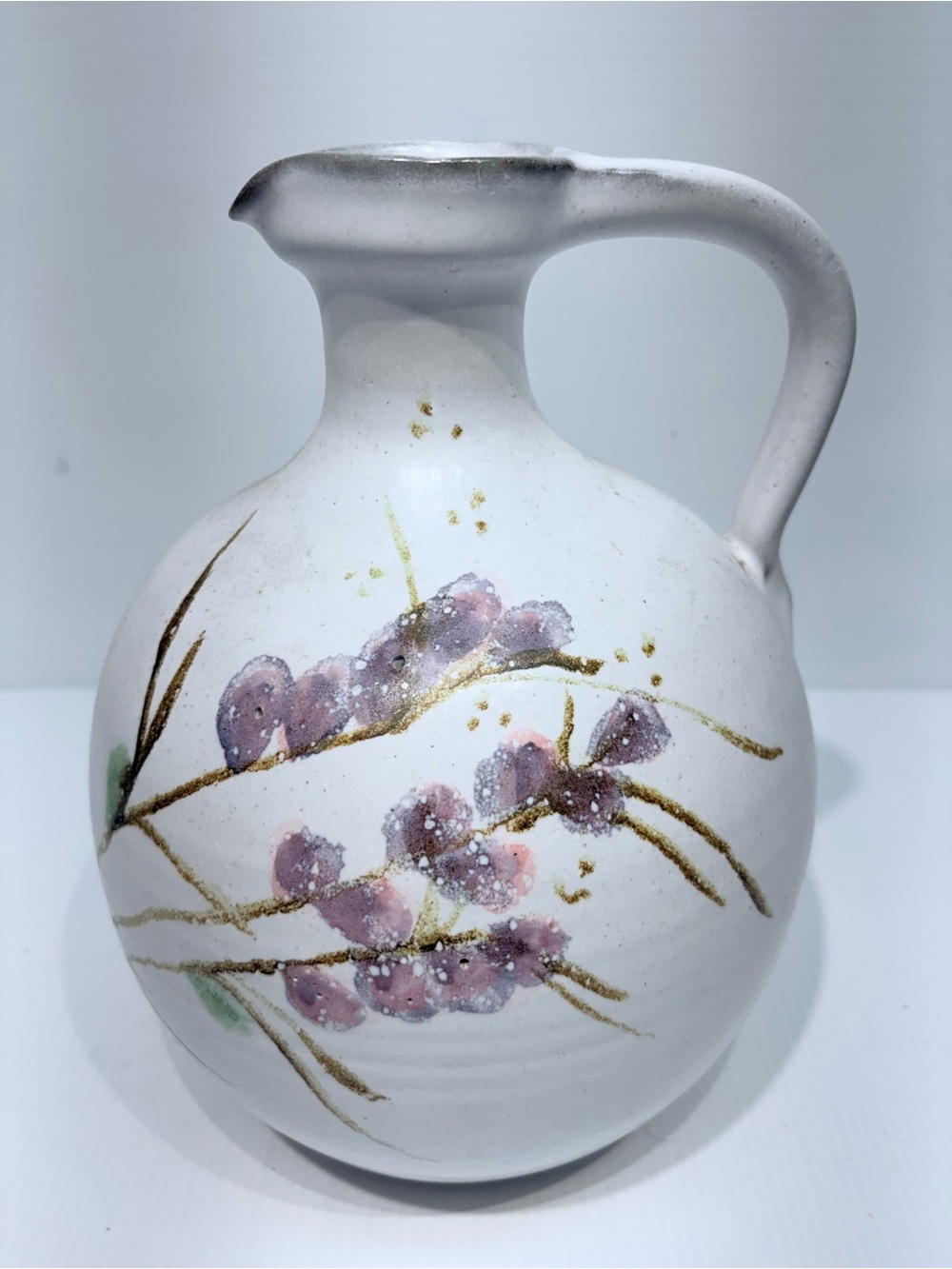 Hand Crafted White Ceramic Pitcher with Pink Floral Accents